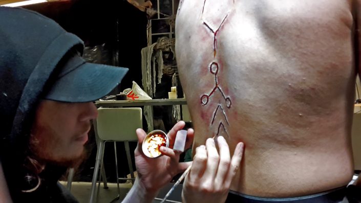 For Prop making, old-school polariod pictures, showing scars, were developed!