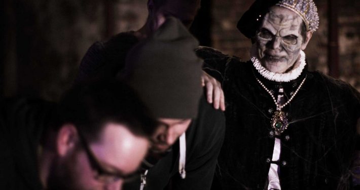 Helping out as light assistance and equipment-gut + on-location photograph, documenting the scene.